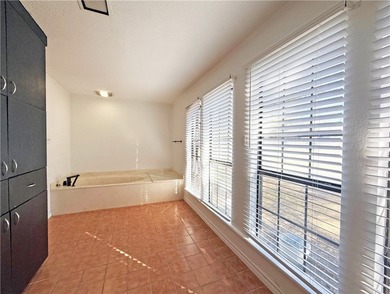 This classic-style 2-story residence is a statement of elegance on Rockport Country Club in Texas - for sale on GolfHomes.com, golf home, golf lot