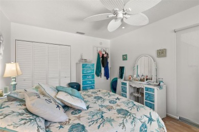 WELCOME TO THE GREEN DOLPHIN! This beautifully updated end-unit on Tarpon Springs Golf Course in Florida - for sale on GolfHomes.com, golf home, golf lot