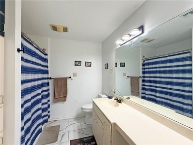 This classic-style 2-story residence is a statement of elegance on Rockport Country Club in Texas - for sale on GolfHomes.com, golf home, golf lot