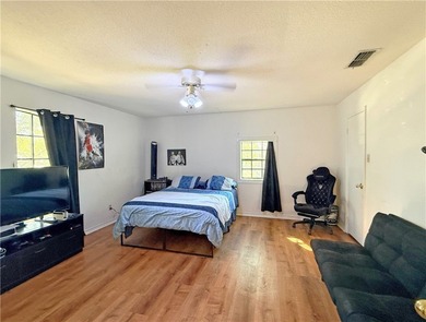 This classic-style 2-story residence is a statement of elegance on Rockport Country Club in Texas - for sale on GolfHomes.com, golf home, golf lot