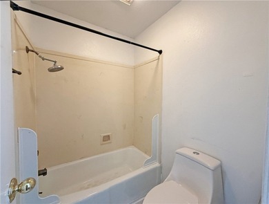 This classic-style 2-story residence is a statement of elegance on Rockport Country Club in Texas - for sale on GolfHomes.com, golf home, golf lot