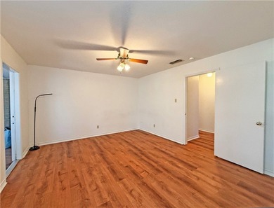 This classic-style 2-story residence is a statement of elegance on Rockport Country Club in Texas - for sale on GolfHomes.com, golf home, golf lot