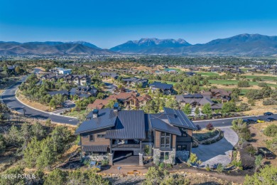 This newly constructed mountain contemporary home is perfectly on Red Ledges Golf Club in Utah - for sale on GolfHomes.com, golf home, golf lot