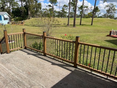 Discover this open-concept 2-bedroom, 2-bath home in the gated on Lake Fairways Country Club in Florida - for sale on GolfHomes.com, golf home, golf lot