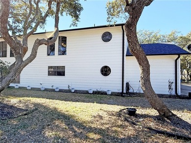 This classic-style 2-story residence is a statement of elegance on Rockport Country Club in Texas - for sale on GolfHomes.com, golf home, golf lot