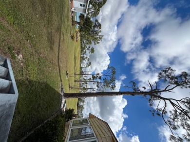 Discover this open-concept 2-bedroom, 2-bath home in the gated on Lake Fairways Country Club in Florida - for sale on GolfHomes.com, golf home, golf lot