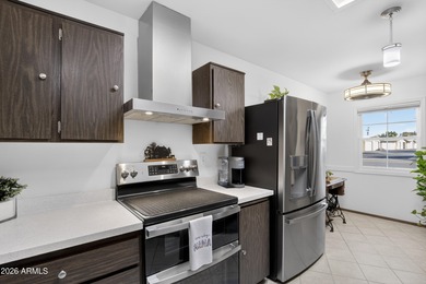 ASSUMABLE 5.1% MTG. Spacious open living in a coveted location on Sun City-Willow Creek / Willow Brook  in Arizona - for sale on GolfHomes.com, golf home, golf lot