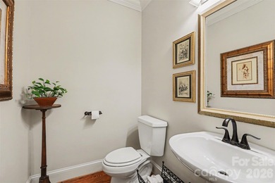 Welcome to this beautifully updated 4-bedroom, 3.5-bath home on TPC at Piper Glen in North Carolina - for sale on GolfHomes.com, golf home, golf lot