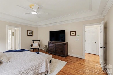 Welcome to this beautifully updated 4-bedroom, 3.5-bath home on TPC at Piper Glen in North Carolina - for sale on GolfHomes.com, golf home, golf lot