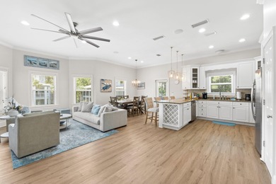 SPACIOUS HOME - RESORT-STYLE POOL - TWO INDOOR LIVING AREAS - on Santa Rosa Golf and Beach Club in Florida - for sale on GolfHomes.com, golf home, golf lot