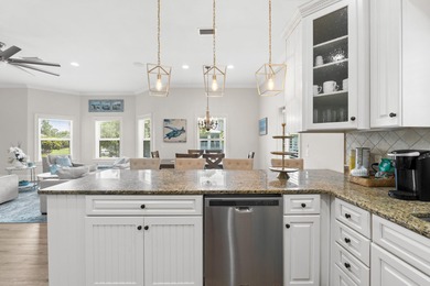 SPACIOUS HOME - RESORT-STYLE POOL - TWO INDOOR LIVING AREAS - on Santa Rosa Golf and Beach Club in Florida - for sale on GolfHomes.com, golf home, golf lot