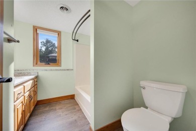 Do not miss this wonderfully updated home. It's located right on Forest Hills Golf Club in Minnesota - for sale on GolfHomes.com, golf home, golf lot