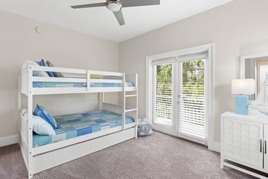 SPACIOUS HOME - RESORT-STYLE POOL - TWO INDOOR LIVING AREAS - on Santa Rosa Golf and Beach Club in Florida - for sale on GolfHomes.com, golf home, golf lot