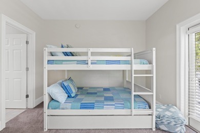 SPACIOUS HOME - RESORT-STYLE POOL - TWO INDOOR LIVING AREAS - on Santa Rosa Golf and Beach Club in Florida - for sale on GolfHomes.com, golf home, golf lot