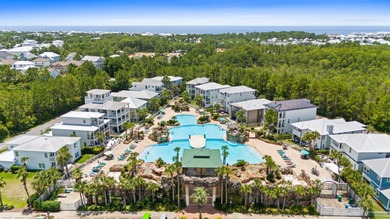 SPACIOUS HOME - RESORT-STYLE POOL - TWO INDOOR LIVING AREAS - on Santa Rosa Golf and Beach Club in Florida - for sale on GolfHomes.com, golf home, golf lot