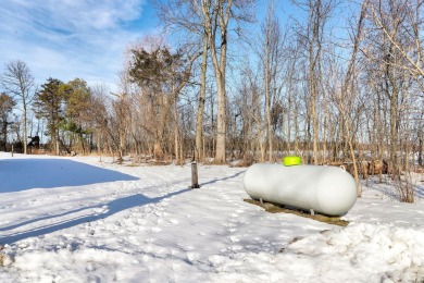 Looking for affordable country living? This charming 2-bedroom on Beeches Golf Club  in Michigan - for sale on GolfHomes.com, golf home, golf lot