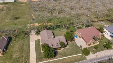 You found it! Lovingly maintained and improved by the current on Pecan Plantation Country Club in Texas - for sale on GolfHomes.com, golf home, golf lot