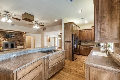 You found it! Lovingly maintained and improved by the current on Pecan Plantation Country Club in Texas - for sale on GolfHomes.com, golf home, golf lot