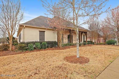 Located in the highly sought-after Reunion neighborhood, this on Reunion Golf Club in Mississippi - for sale on GolfHomes.com, golf home, golf lot