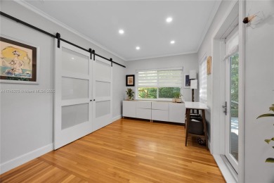 Nestled in the desirable streets of North Gables, this charming on Granada Golf Club in Florida - for sale on GolfHomes.com, golf home, golf lot
