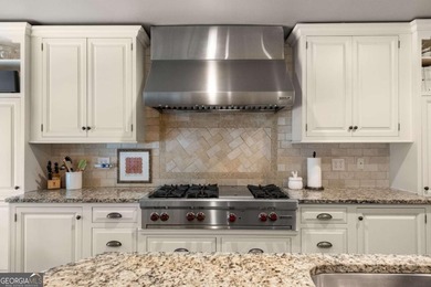 Beautifully situated on a peaceful 1.2-acre lot in one of on North Fulton Golf Course in Georgia - for sale on GolfHomes.com, golf home, golf lot