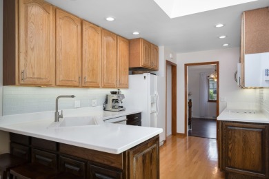 Airy & Elegant Bi-Level Retreat - Move-In Ready in a Great Mount on Mt. Prospect Golf Club in Illinois - for sale on GolfHomes.com, golf home, golf lot