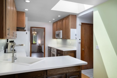 Airy & Elegant Bi-Level Retreat - Move-In Ready in a Great Mount on Mt. Prospect Golf Club in Illinois - for sale on GolfHomes.com, golf home, golf lot