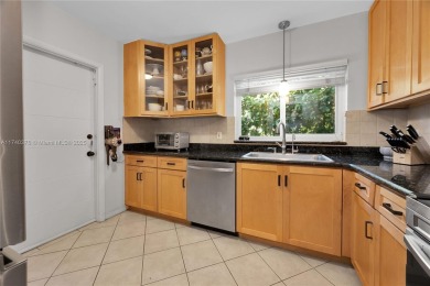 Nestled in the desirable streets of North Gables, this charming on Granada Golf Club in Florida - for sale on GolfHomes.com, golf home, golf lot