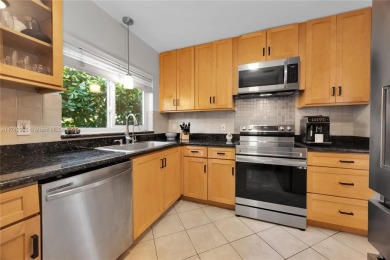 Nestled in the desirable streets of North Gables, this charming on Granada Golf Club in Florida - for sale on GolfHomes.com, golf home, golf lot