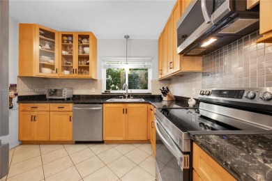 Nestled in the desirable streets of North Gables, this charming on Granada Golf Club in Florida - for sale on GolfHomes.com, golf home, golf lot