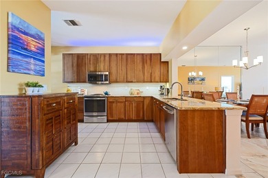 This is a must see Condo ~ tastefully updated, meticulously on Cypress Lake Country Club in Florida - for sale on GolfHomes.com, golf home, golf lot