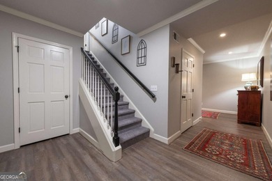 Beautifully situated on a peaceful 1.2 acre lot in one of on North Fulton Golf Course in Georgia - for sale on GolfHomes.com, golf home, golf lot