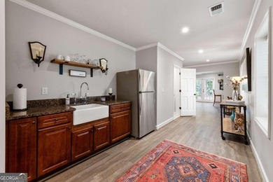 Beautifully situated on a peaceful 1.2 acre lot in one of on North Fulton Golf Course in Georgia - for sale on GolfHomes.com, golf home, golf lot