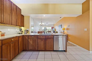 This is a must see Condo ~ tastefully updated, meticulously on Cypress Lake Country Club in Florida - for sale on GolfHomes.com, golf home, golf lot