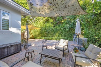 Nestled in the desirable streets of North Gables, this charming on Granada Golf Club in Florida - for sale on GolfHomes.com, golf home, golf lot