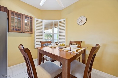 This is a must see Condo ~ tastefully updated, meticulously on Cypress Lake Country Club in Florida - for sale on GolfHomes.com, golf home, golf lot