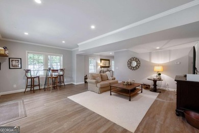 Beautifully situated on a peaceful 1.2 acre lot in one of on North Fulton Golf Course in Georgia - for sale on GolfHomes.com, golf home, golf lot