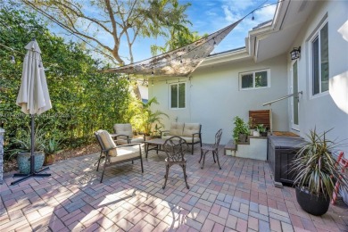 Nestled in the desirable streets of North Gables, this charming on Granada Golf Club in Florida - for sale on GolfHomes.com, golf home, golf lot