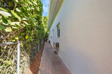 Nestled in the desirable streets of North Gables, this charming on Granada Golf Club in Florida - for sale on GolfHomes.com, golf home, golf lot