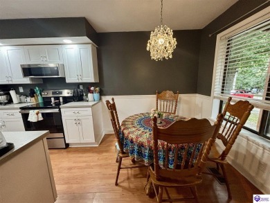 Experience low-maintenance living with beautiful views of the on Doe Valley Country Club in Kentucky - for sale on GolfHomes.com, golf home, golf lot