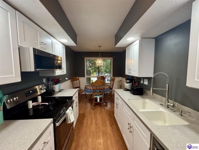 Experience low-maintenance living with beautiful views of the on Doe Valley Country Club in Kentucky - for sale on GolfHomes.com, golf home, golf lot