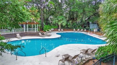 Turnkey Resort Living. Stylish 2BR/2BA + Loft End Unit Villa on Palmetto Dunes Golf Course and Resort in South Carolina - for sale on GolfHomes.com, golf home, golf lot