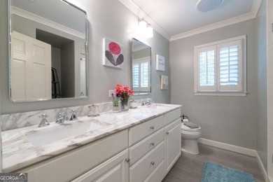 Beautifully situated on a peaceful 1.2 acre lot in one of on North Fulton Golf Course in Georgia - for sale on GolfHomes.com, golf home, golf lot