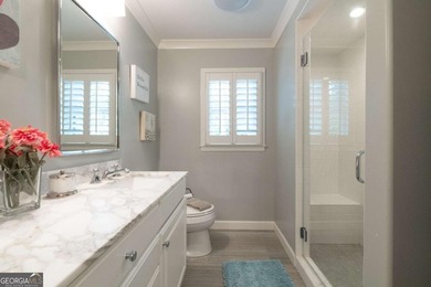 Beautifully situated on a peaceful 1.2 acre lot in one of on North Fulton Golf Course in Georgia - for sale on GolfHomes.com, golf home, golf lot