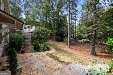 Beautifully situated on a peaceful 1.2 acre lot in one of on North Fulton Golf Course in Georgia - for sale on GolfHomes.com, golf home, golf lot