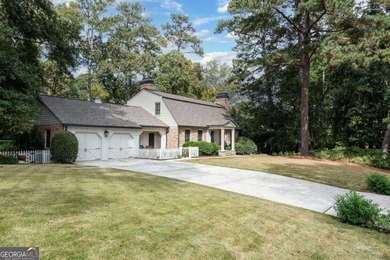 Beautifully situated on a peaceful 1.2 acre lot in one of on North Fulton Golf Course in Georgia - for sale on GolfHomes.com, golf home, golf lot