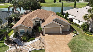 This gorgeous Lantana is located in the Village of Saint Charles on Glenview Championship Golf and Country Club in Florida - for sale on GolfHomes.com, golf home, golf lot