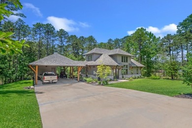 This stunning 2-story residence, nestled gracefully on the on Rayburn Country Club in Texas - for sale on GolfHomes.com, golf home, golf lot