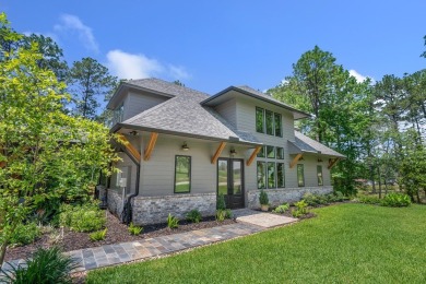 This stunning 2-story residence, nestled gracefully on the on Rayburn Country Club in Texas - for sale on GolfHomes.com, golf home, golf lot