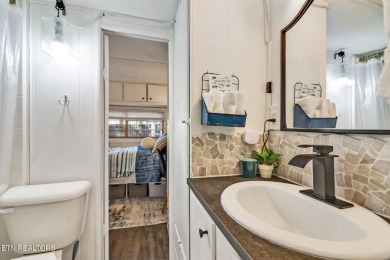 This lovely home on a one and a half lot provides ample privacy on Lake Tansi Village Country Club in Tennessee - for sale on GolfHomes.com, golf home, golf lot